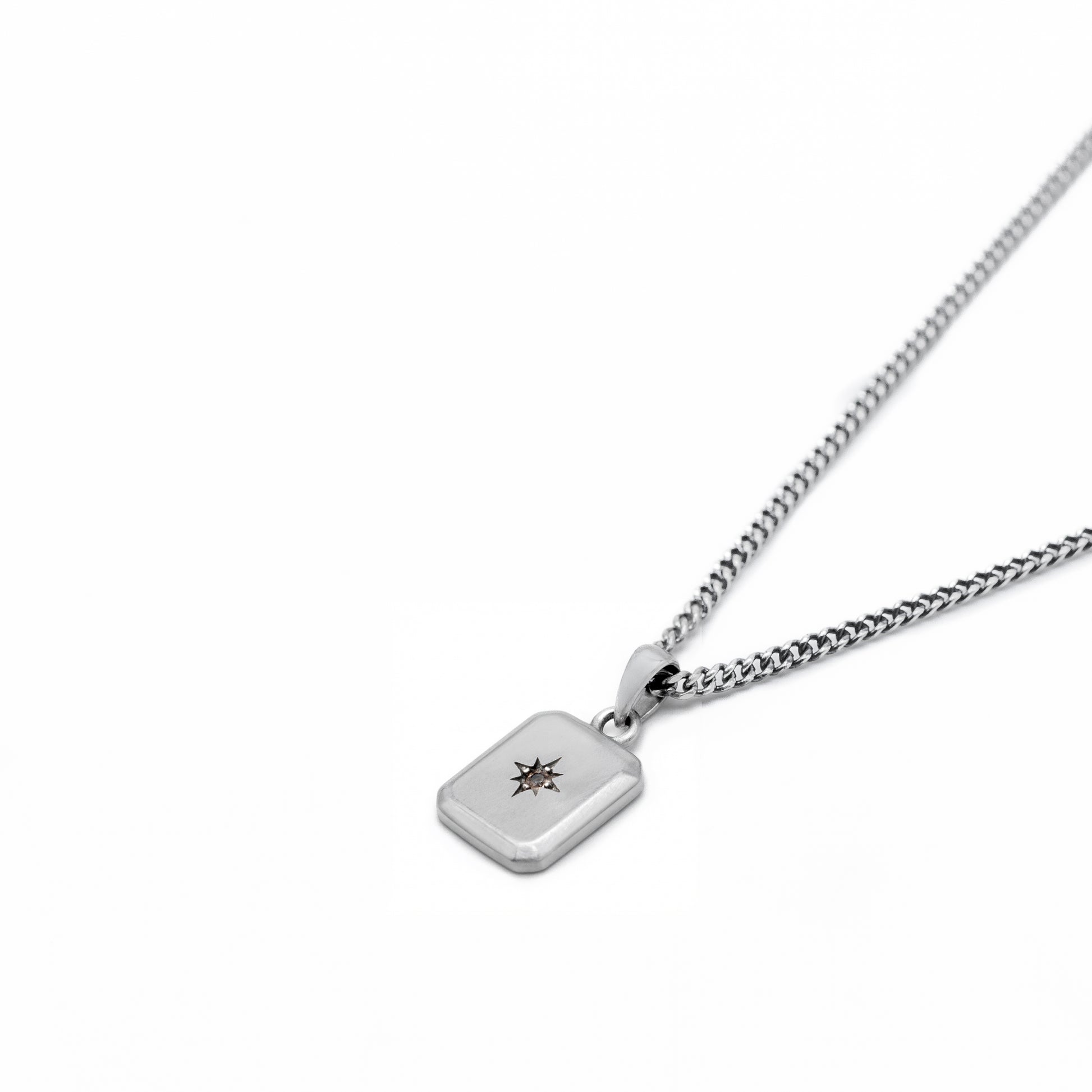 Silver pendant necklace with rectangular pendant with star setting and smoky quartz gemstone