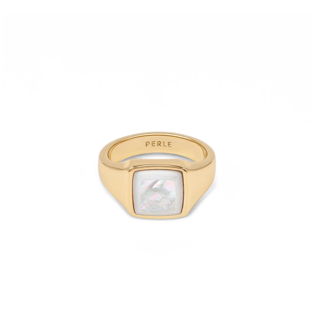 Gold plated Silver ring with Rhodium plating and large Mother of Pearl stone on a white background