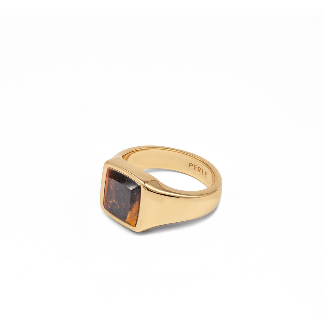 Gold plated Silver ring with Rhodium plating and large Tigers Eye stone on a white background