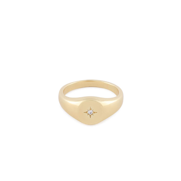 Gold plated Silver signet ring with oval face with star setting and clear gemstone - Serge DeNimes