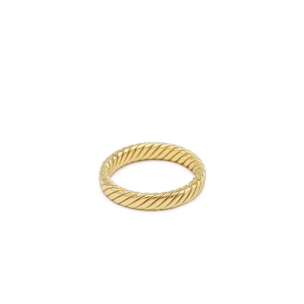 Gold plated Silver band ring with a twist detail on a white background by Serge DeNimes