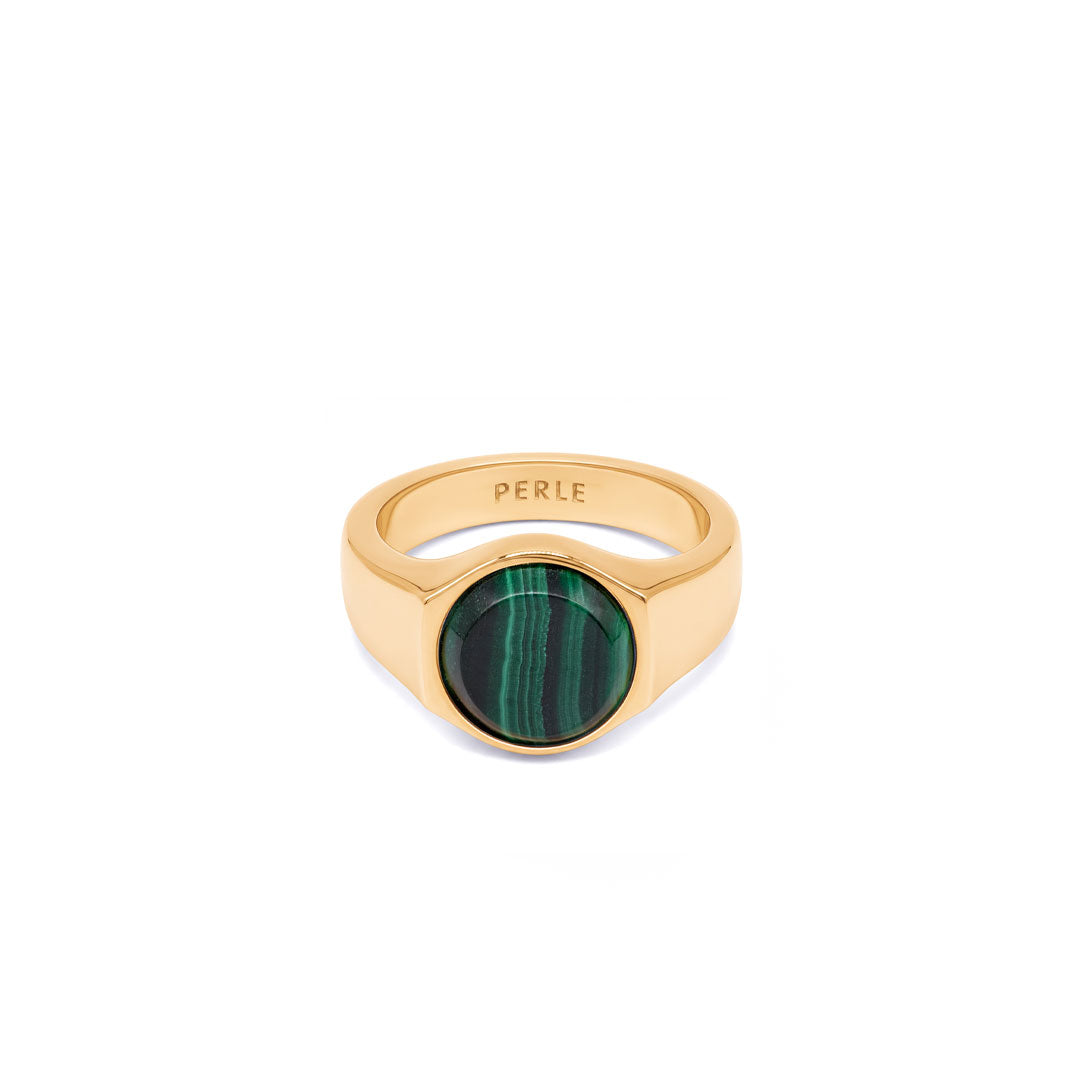 Gold plated Silver ring with Rhodium plating and large Malachite stone on a white background