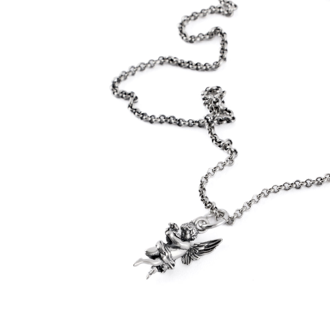Silver necklace with a cherub pendant on a white background