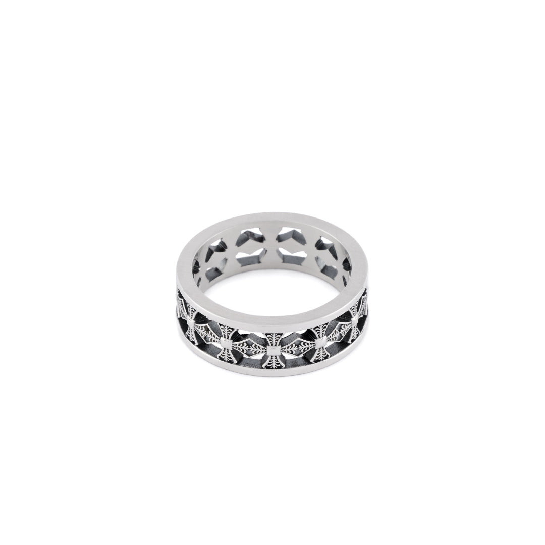 Silver cut out band ring with repeated detailed cross motifs - Serge DeNimes