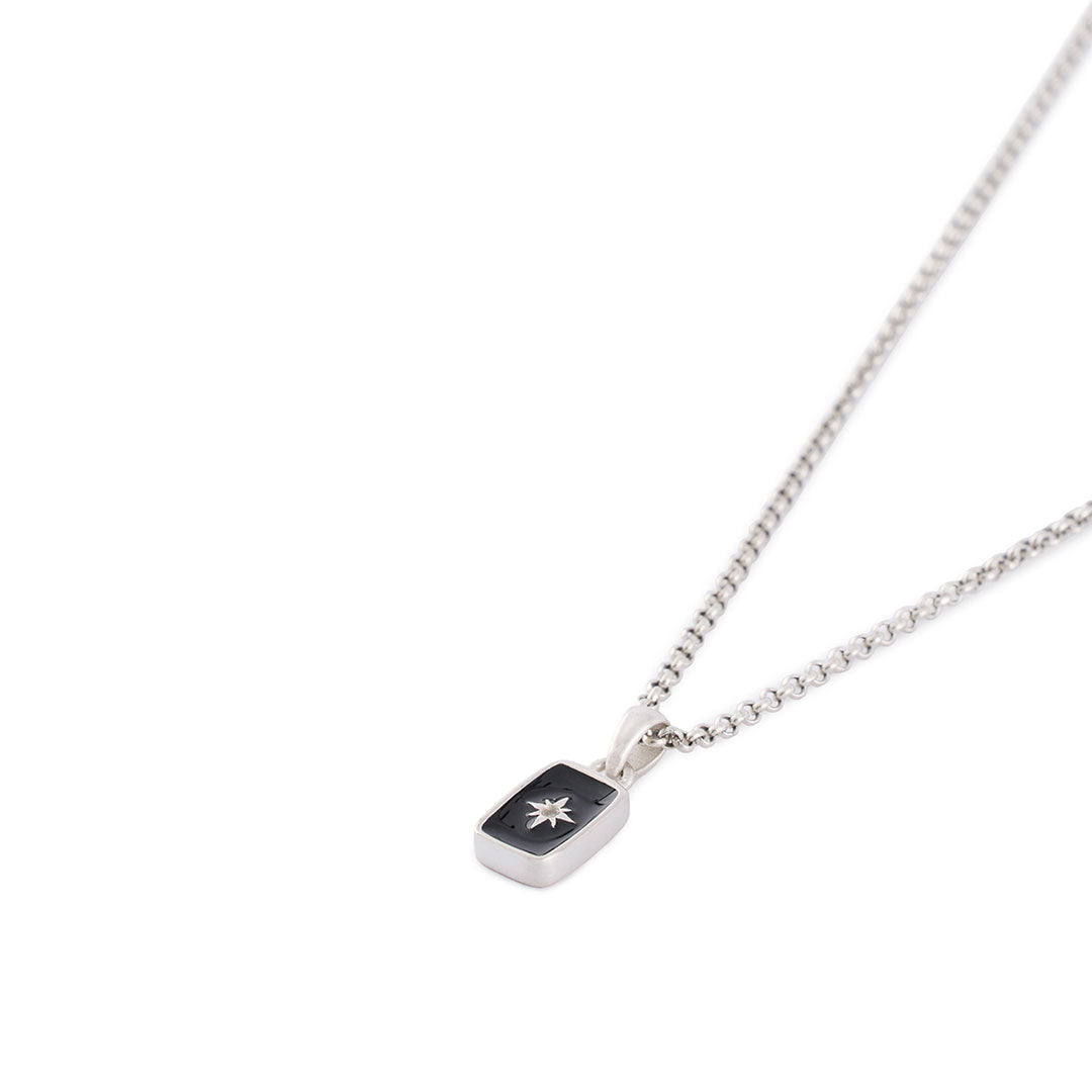 Silver pendant necklace with rolo chain and rectangle pendant with black enamel, star setting and clear gemstone - Serge DeNimes