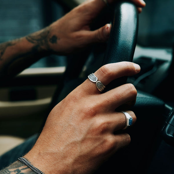 Model hand wearing Silver rings