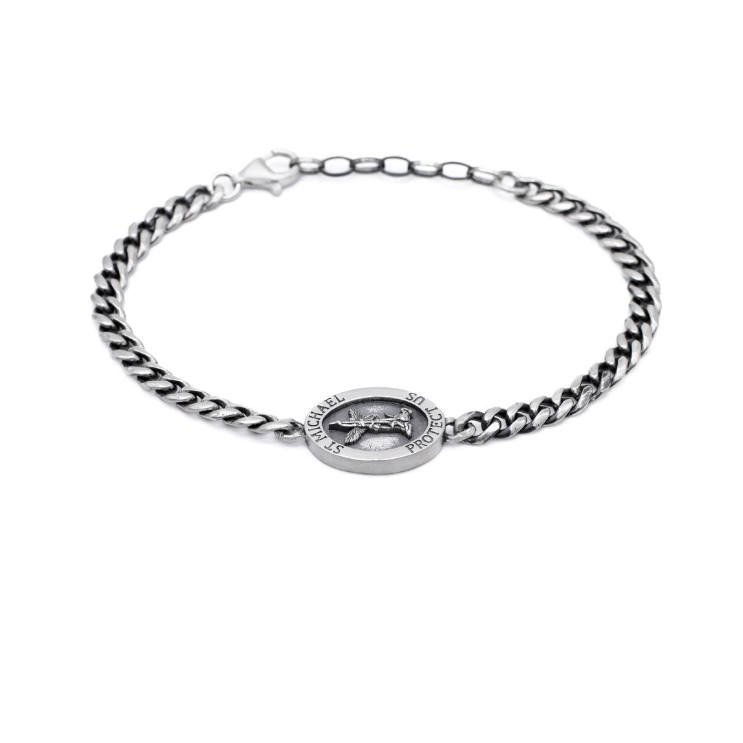 Silver chain bracelet with an oval pendant depicting St Michael by Serge DeNimes