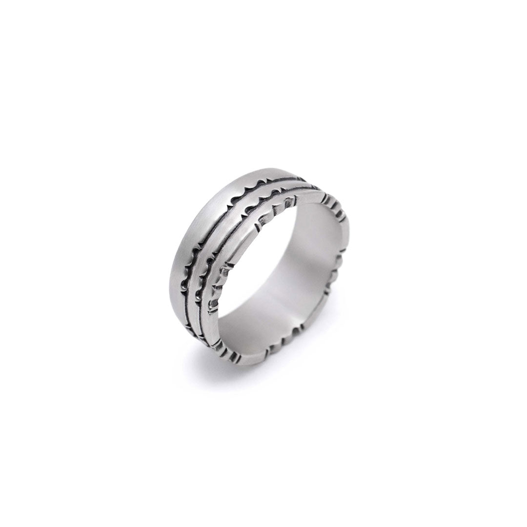 Silver ring with stacked effect and shapely edges by Serge DeNimes