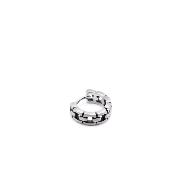 Sterling Silver huggie earring with a square cut out design in a closed position by Serge DeNimes