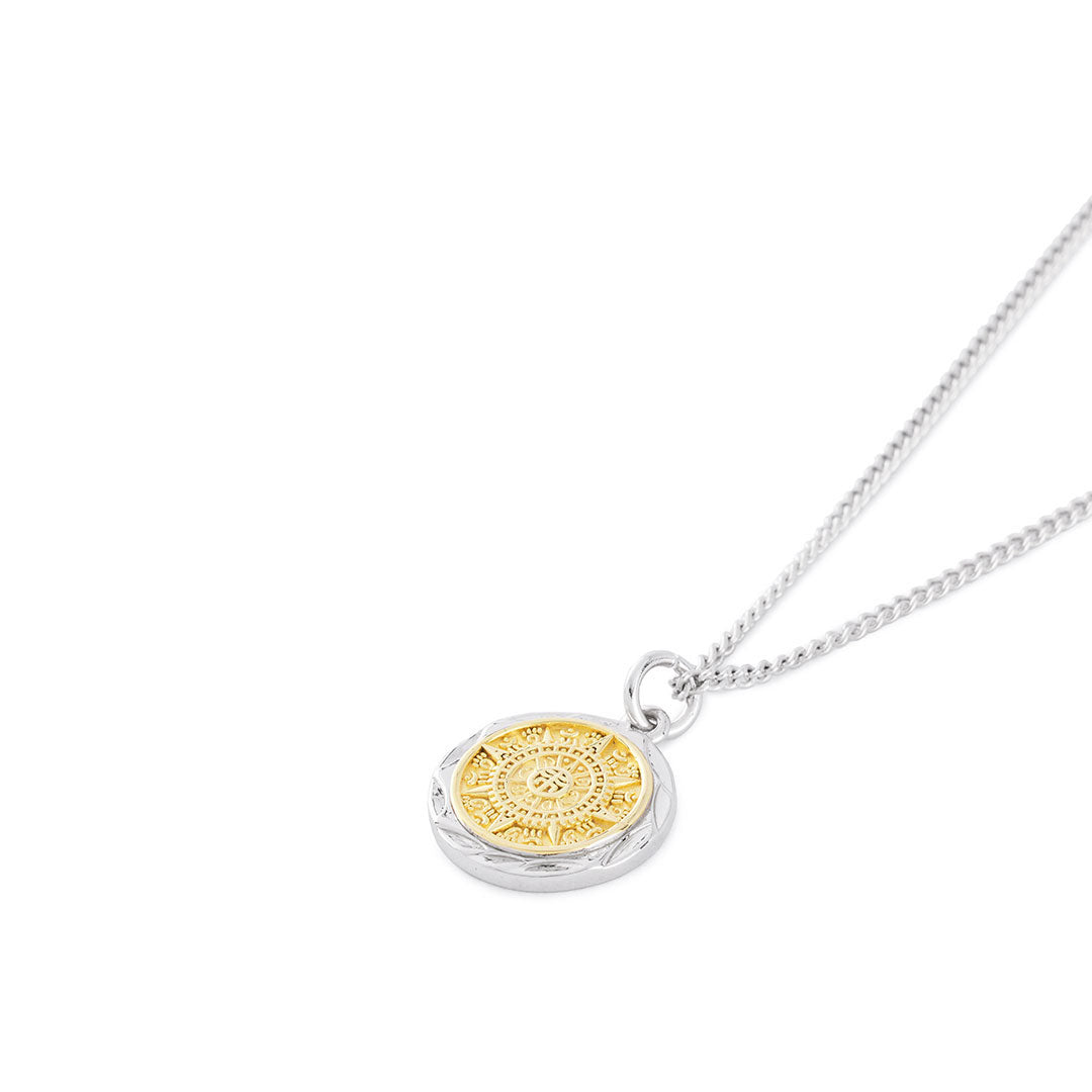 Silver curb chain necklace with round pendant in the style of an aztec compass with gold plated detail - Serge DeNimes