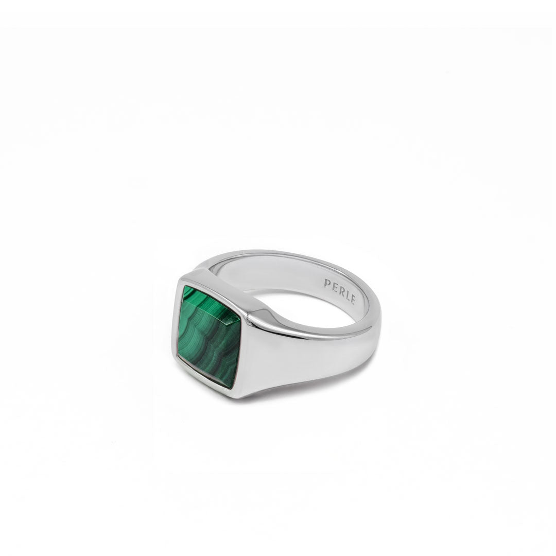 Silver ring with Rhodium plating and large Malachite stone on a white background