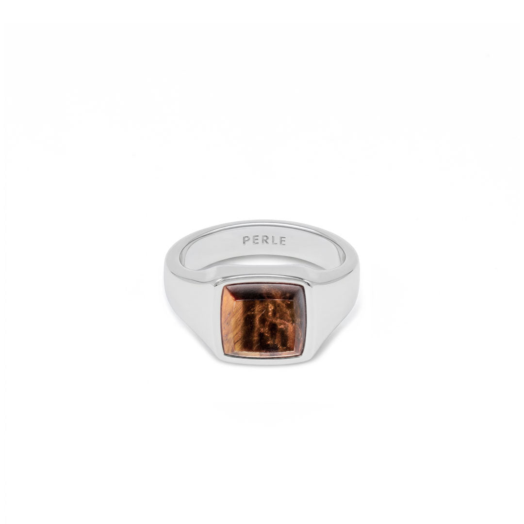 Silver ring with Rhodium plating and large Tigers Eye stone on a white background