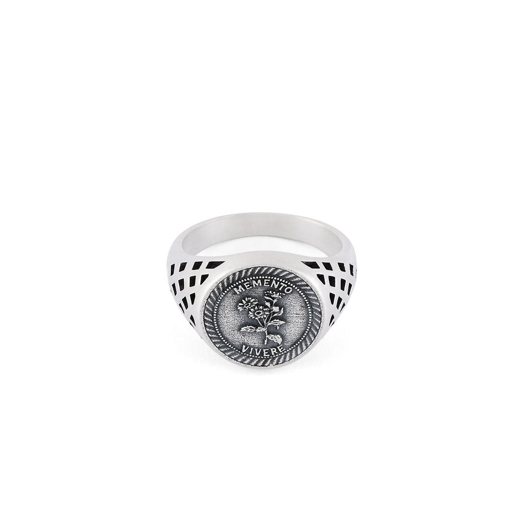 Silver Sovereign style ring with cut out detailing on the shoulders, dashed border around the face and flower motif with latin motto - Serge DeNimes