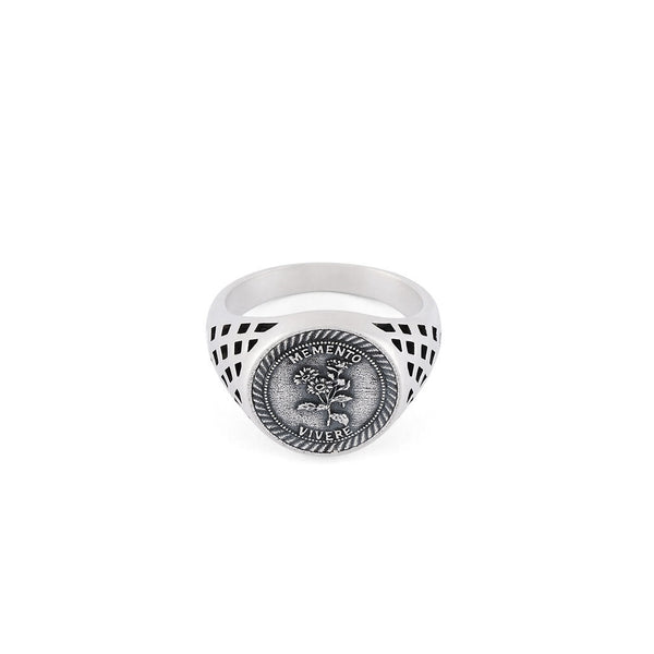 Silver Sovereign style ring with cut out detailing on the shoulders, dashed border around the face and flower motif with latin motto - Serge DeNimes