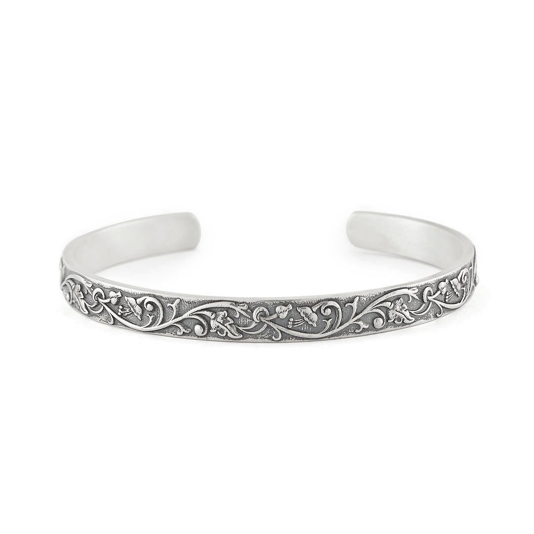 Sterling Silver Cuff with floral motif on outside and smooth inside - Serge DeNimes