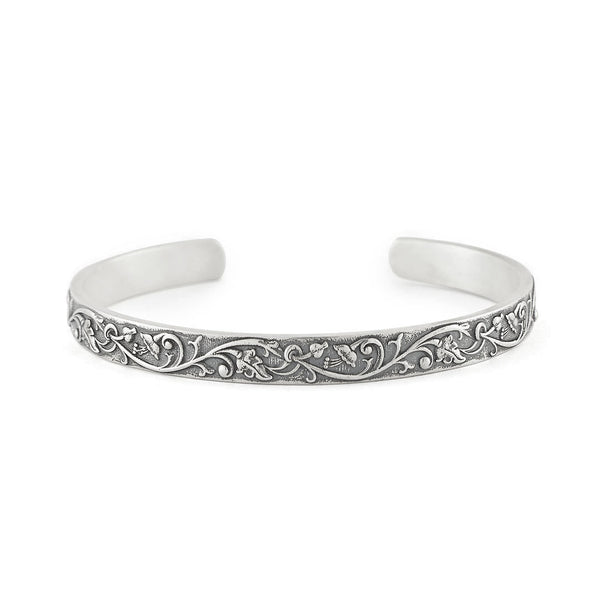 Sterling Silver Cuff with floral motif on outside and smooth inside - Serge DeNimes