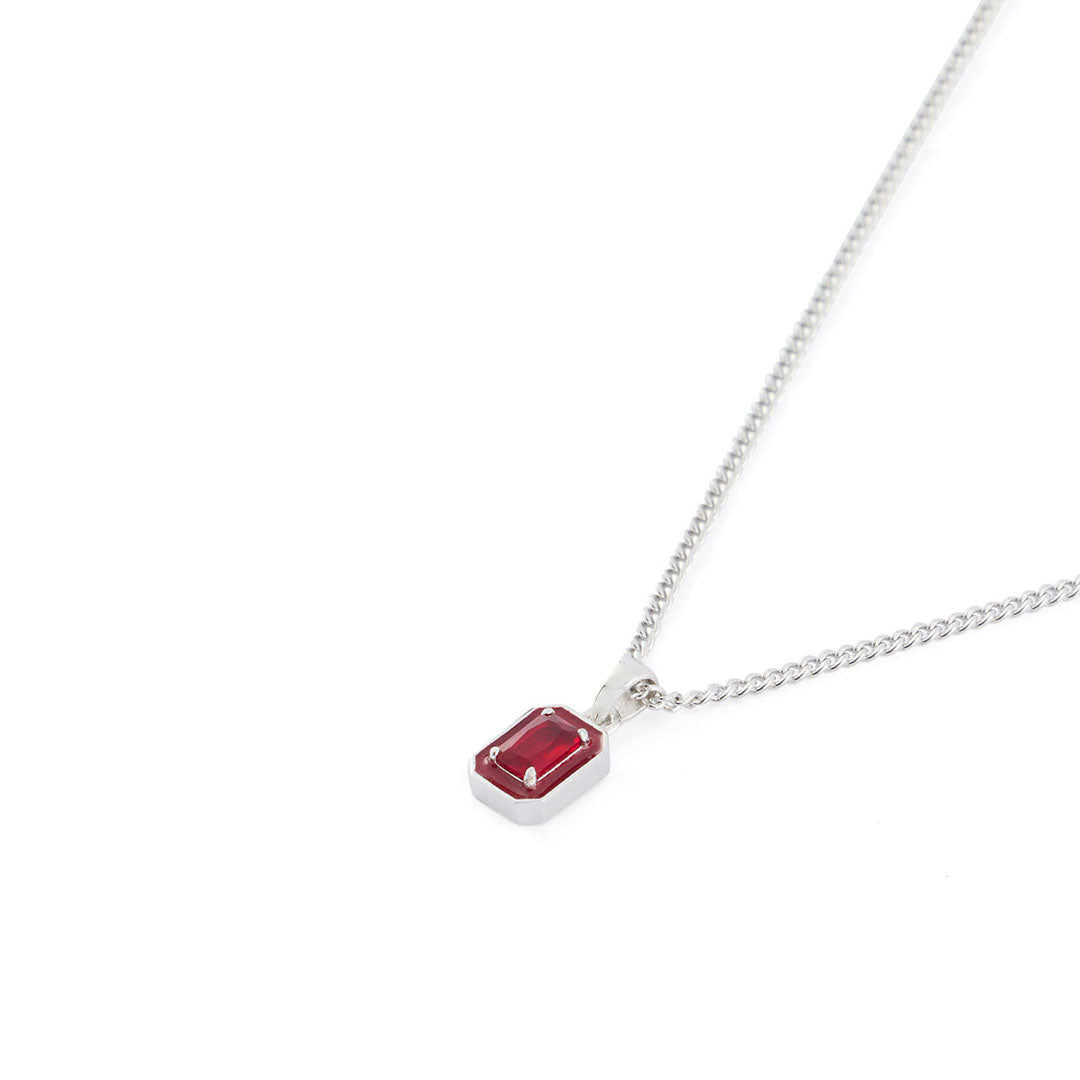 Silver curb chain with rectangle pendant with red enamel frame and large red gemstone - Serge DeNimes