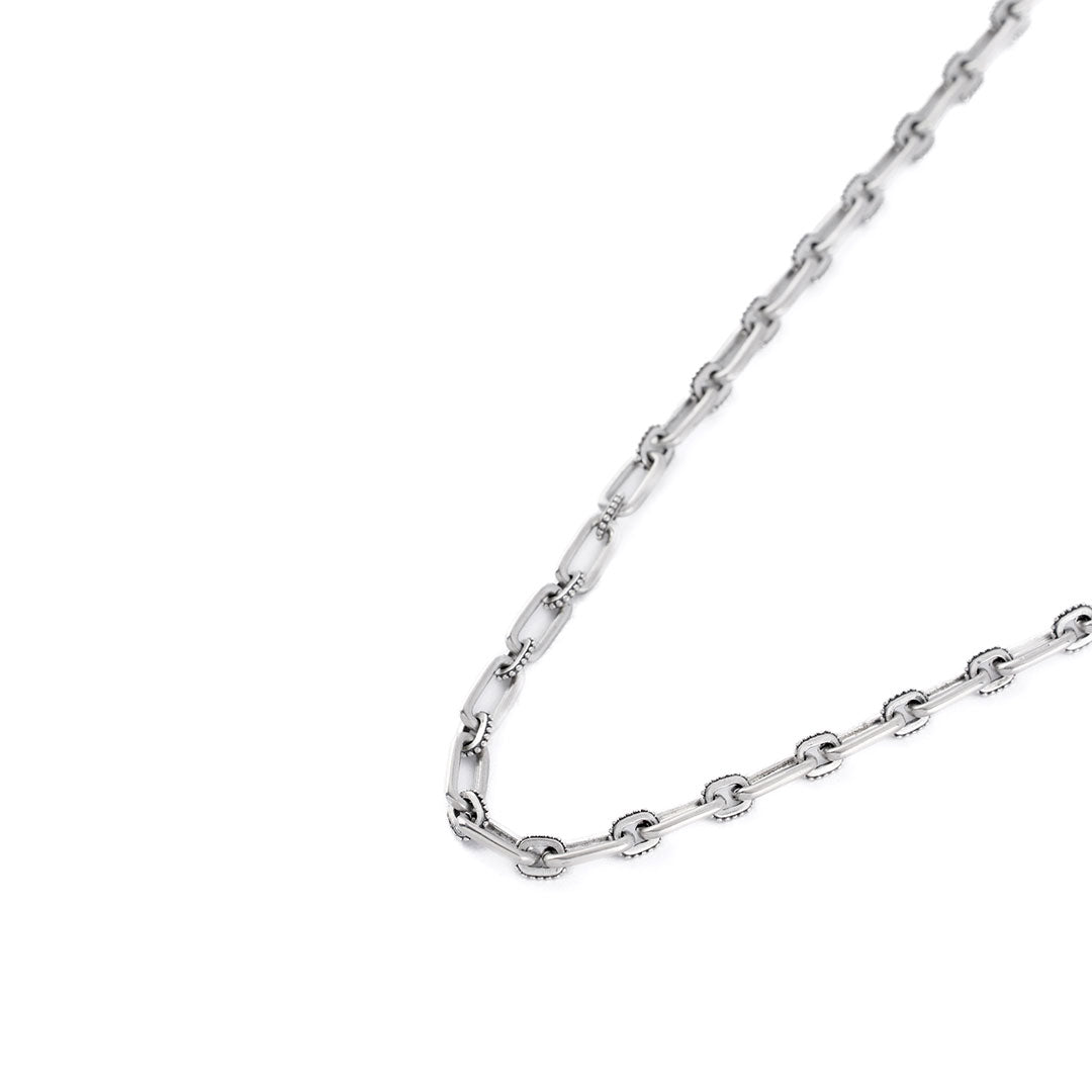 Silver chain necklace with alternating long oval links and dotted smaller links - Serge DeNimes